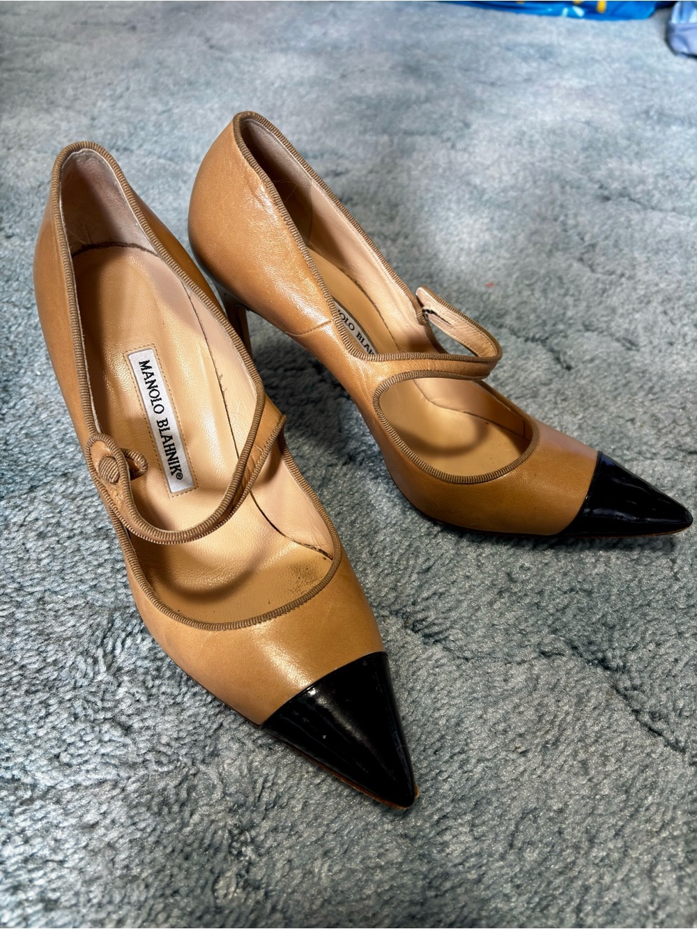 Manolo Blahnik Tan Leather Mary Jane Pumps with Black Pointed Toes